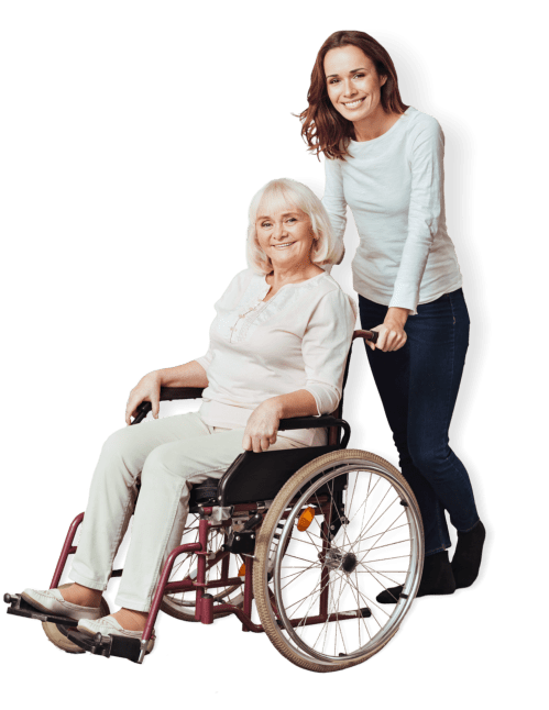 senior woman sitting in wheelchair with her daughter